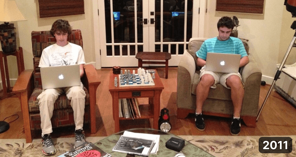 Noah Martin and Josh Cohenzadeh in a family living room in 2011