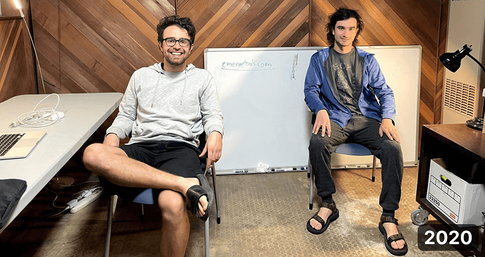 Josh Cohenzadeh and Noah Martin in a garage after buying their first domain